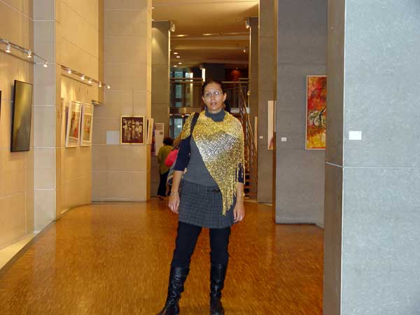 Einat and her works at the exhibition
